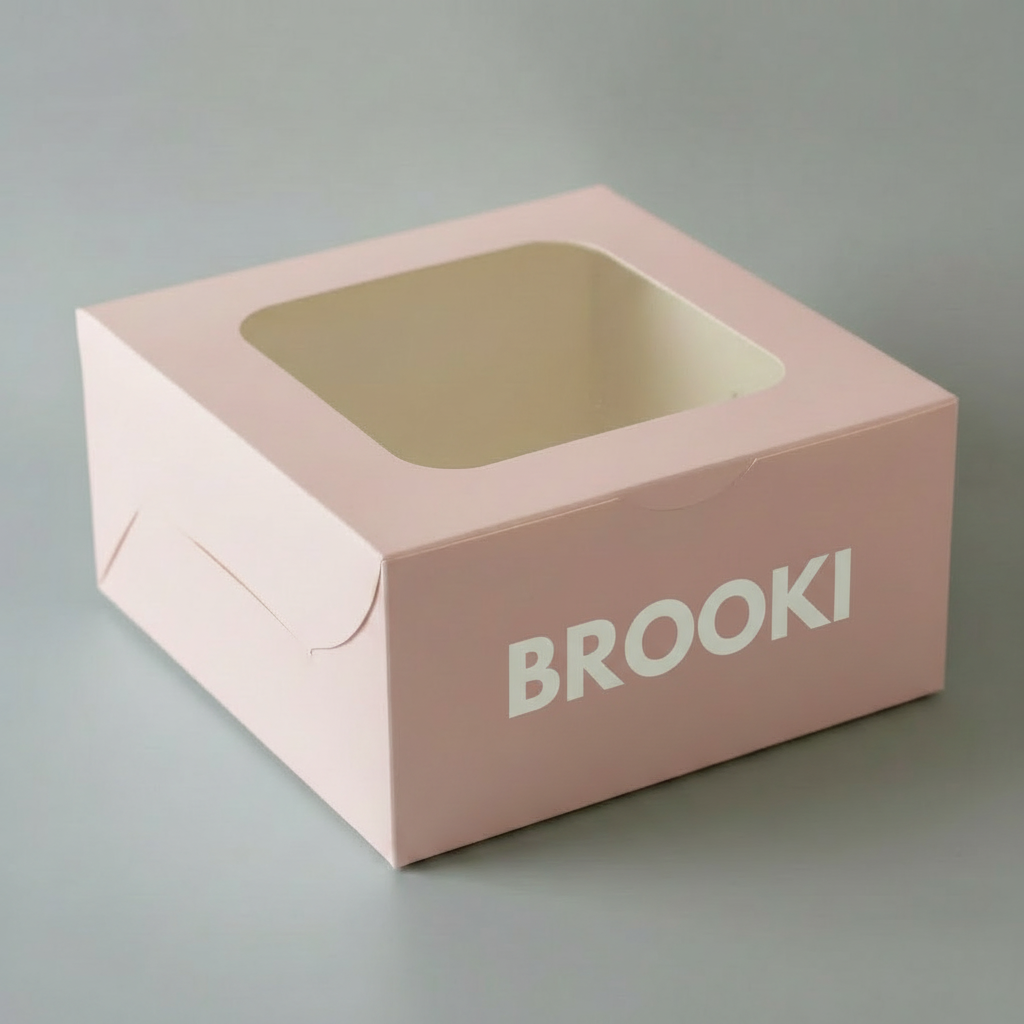 Pink box with a window and 'BROOKI' branding on a gray background